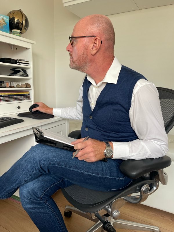 Dennis Brett MCIOB at work in the Site Sage office
